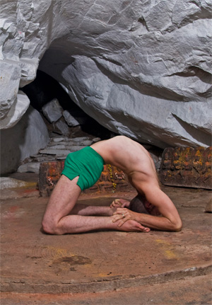 Russell in Kapotasana in a cave!